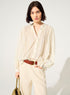 Oversized pleated shirt and Calais-Caudry® lace
