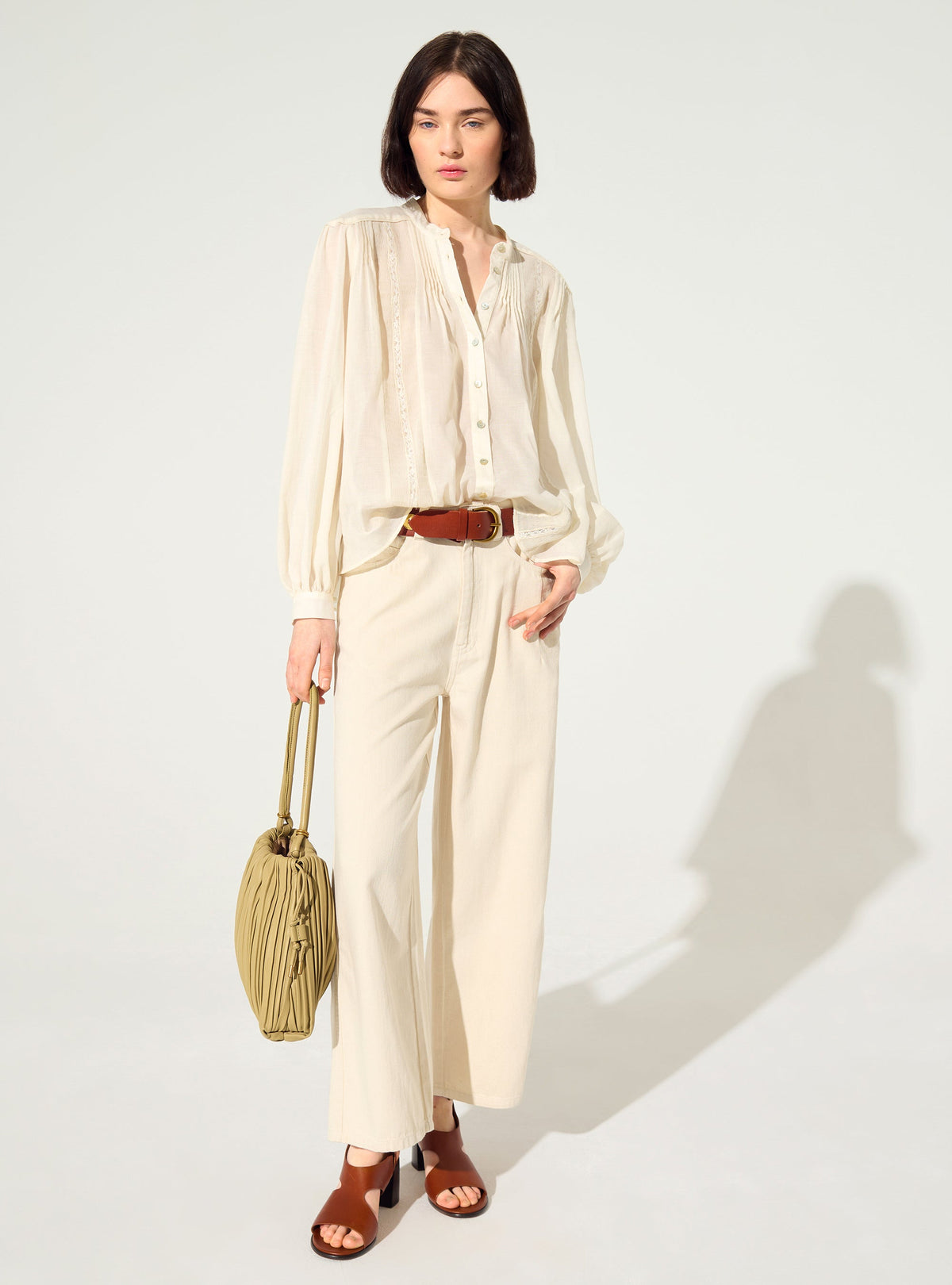 Oversized pleated shirt and Calais-Caudry® lace