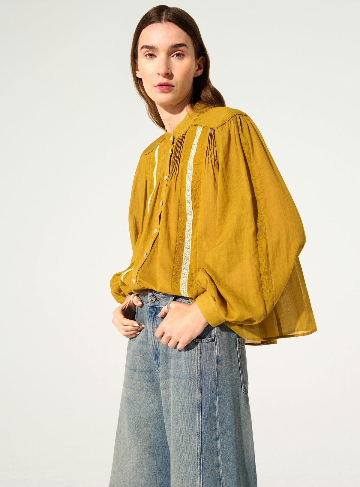 Oversized pleated shirt and Calais-Caudry® lace yellow ochre