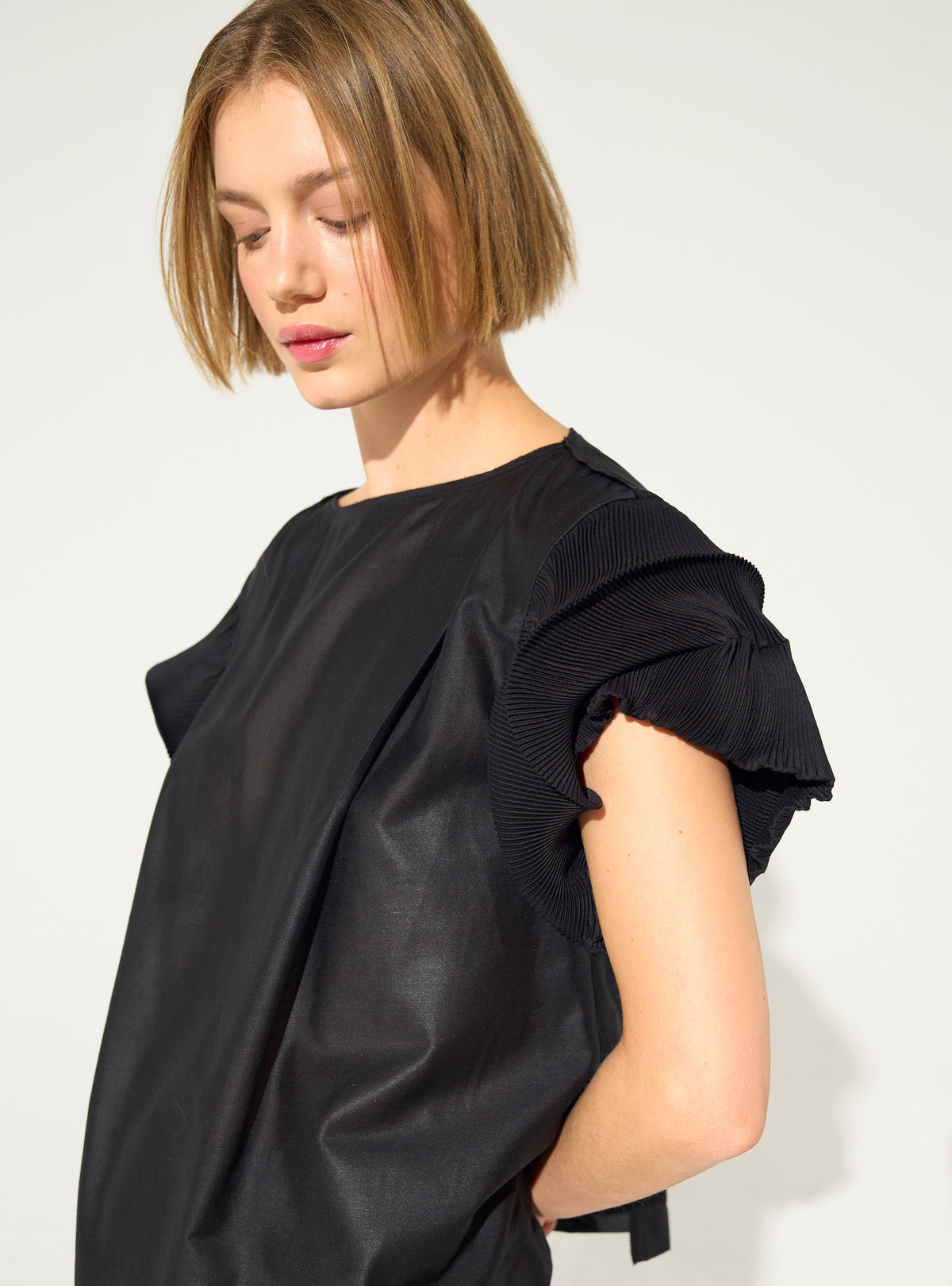 Black pleated blouse