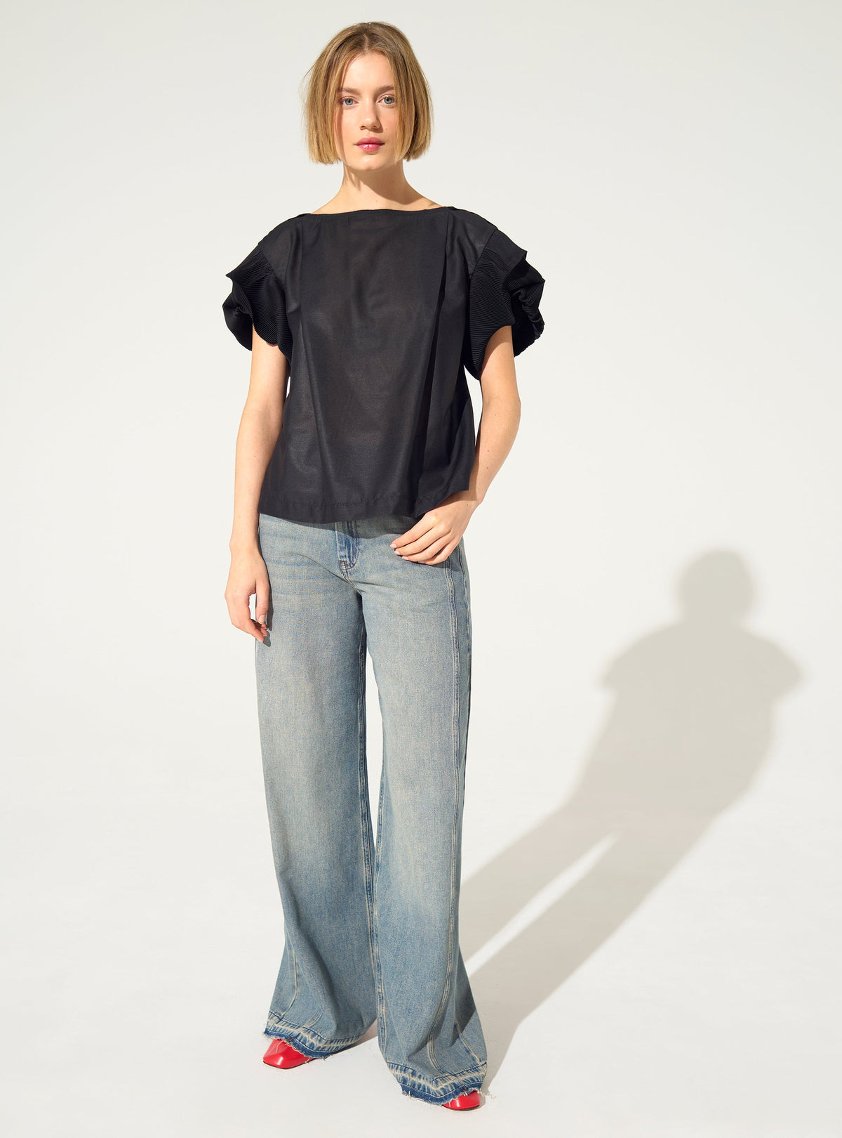 Black pleated blouse